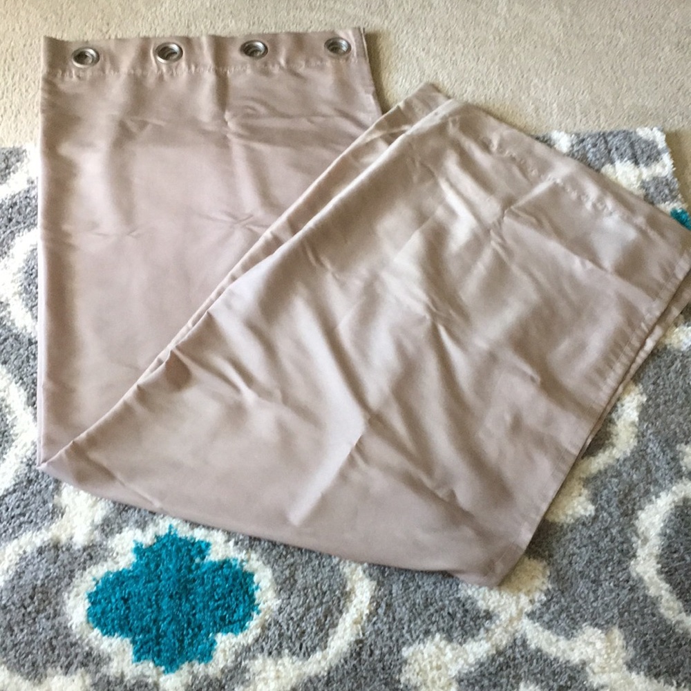 2 tan curtain panels